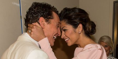 Matthew McConaughey lovingly butts head with his wife Camila Alves. He was shut down twice in the same night by his wife.