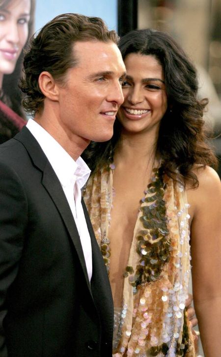 Matthew McConaughey with his wife Camila Alves. They first met at a bar named Joan's.