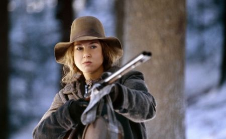 Renee Zellweger holding a double barrel shotgun in the 2003 movie 'Cold Mountain.'