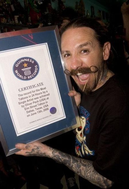 Oliver Peck set world record when he completed 415 tattoos in just 24 hours.