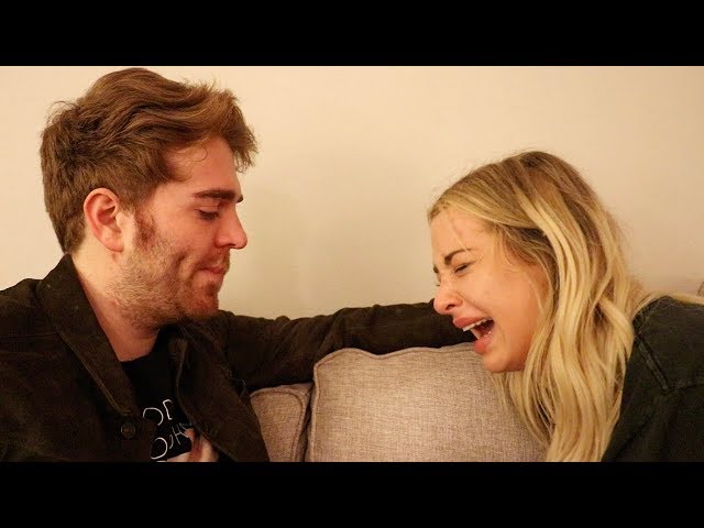 shane and tana on a couch, tana hysterically crying with shane consoling her 