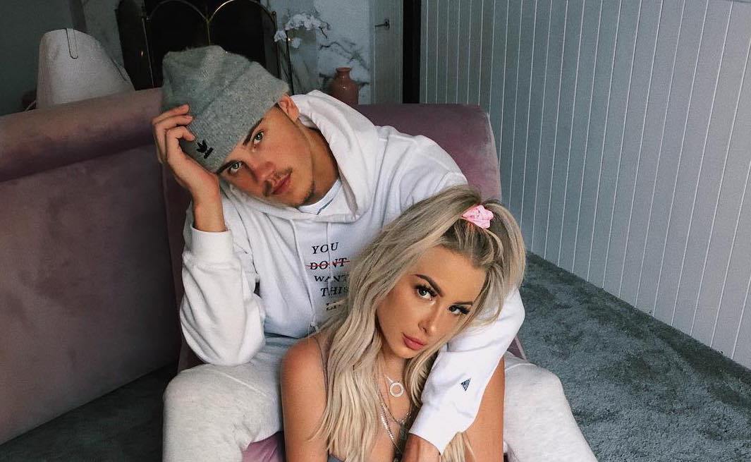 brand and tana hugging wearing white outfit 