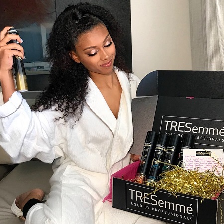 Sierra Capri flaunting her products from TRESemmé.