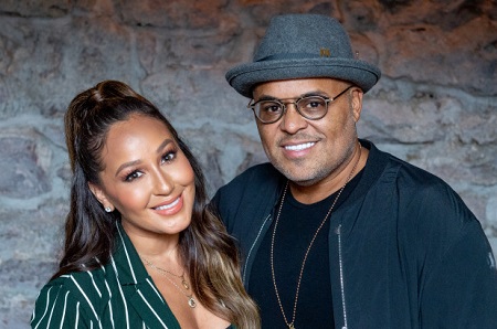 Adrienne Bailon and Israel Houghton.