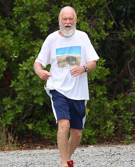 David Letterman keeps his headphones in as he goes for a run on Friday afternoon (March 25) in St. Barts, France.