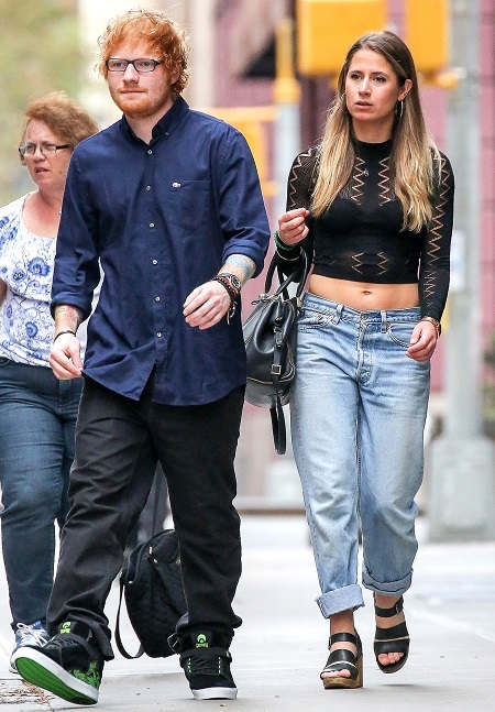 Ed Sheeran walking in the streets with his wife, Cherry Seaborn.