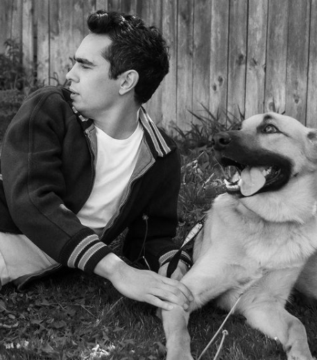 Max Minghella is with his dog.