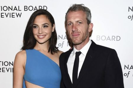 Gal Gadot and Yaron Versano pose for a photograph in red carpet event