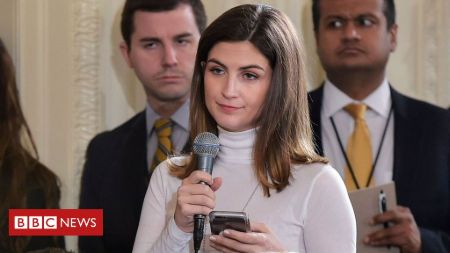 Kaitlan Collins during a press conference.