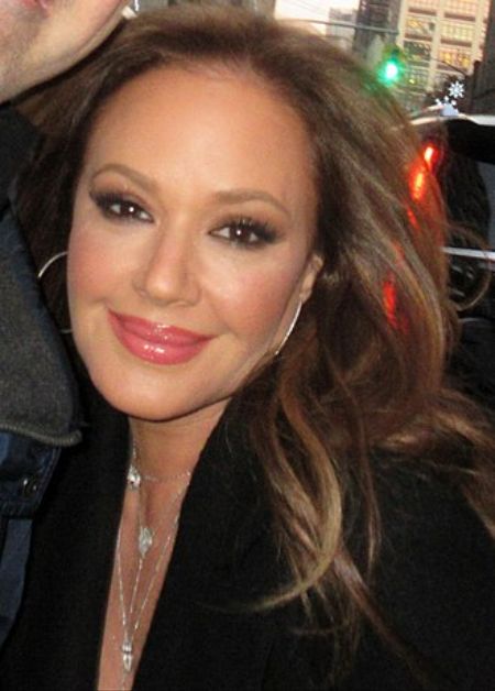 Leah Remini smiling after plastic surgery