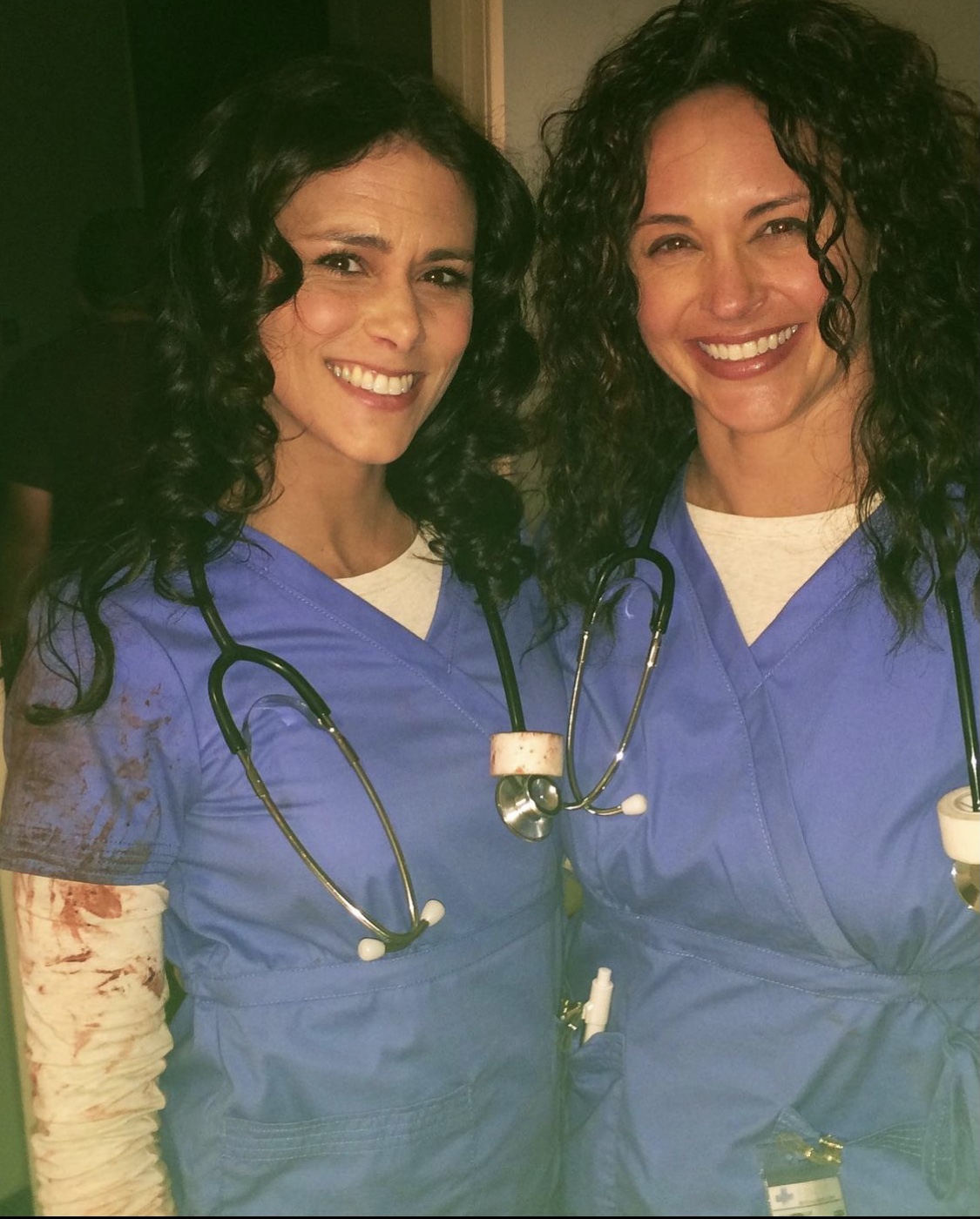 Melissa Ponzio with a fellow actor on Teen Wolf.