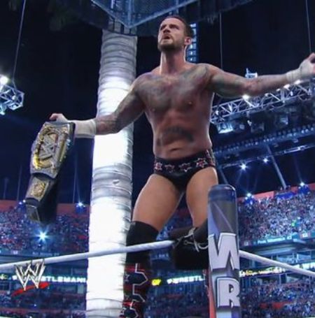 CM Punk with his belt.