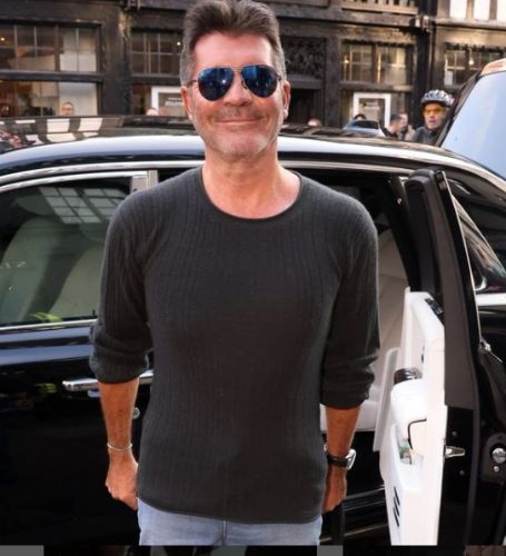 Simon Cowell has confessed that he purchased an electric car after learning about climate change from his son Eric Cowell.