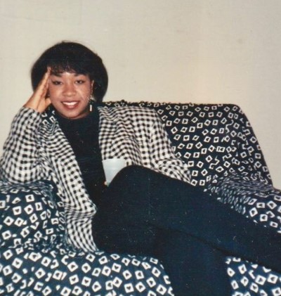 Shonda Rhimes as a young adult woman in B/W photo.