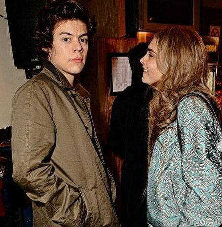 Harry Styles says Cara Delevingne is not my girl.