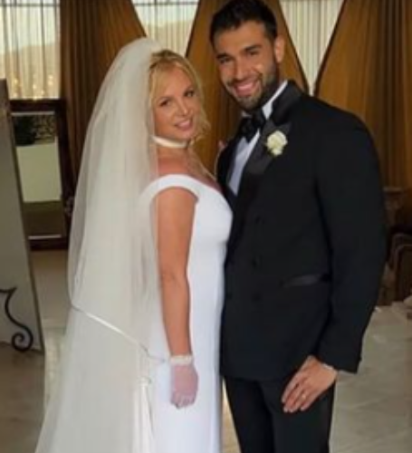 Britney Spears looked every inch at the blushing bride on her wedding day.